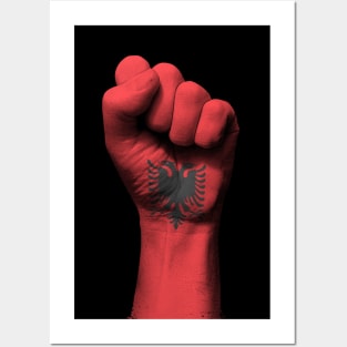 Flag of Albania on a Raised Clenched Fist Posters and Art